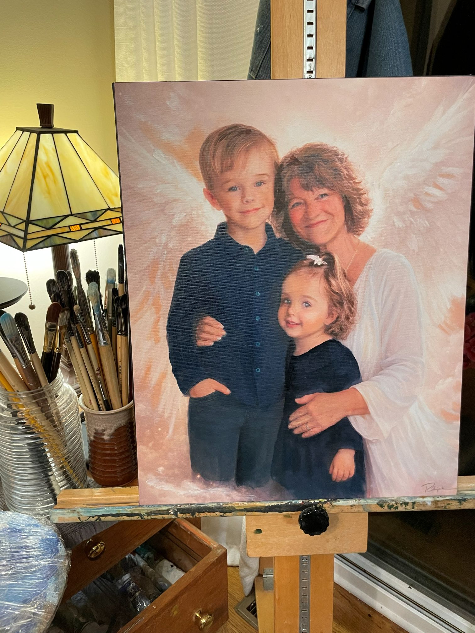 Memorial portrait of a grandmother with two children